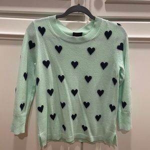 Black hearts and lime green sweater